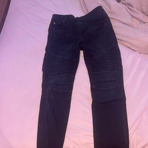 black jeans never worn before dont fit me , have lines and zippers in the front